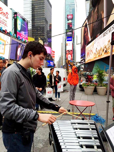 Devon playing marimbas with Mantra in Times Square.